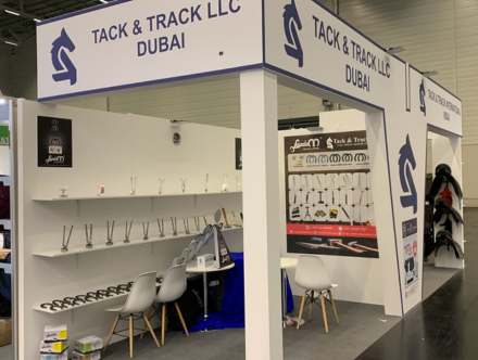 Expo Fabrication and Storage Services - Tack & Track LLC Booth Designed by Expo Creators for Trade Show Displays and Graphics Printing.